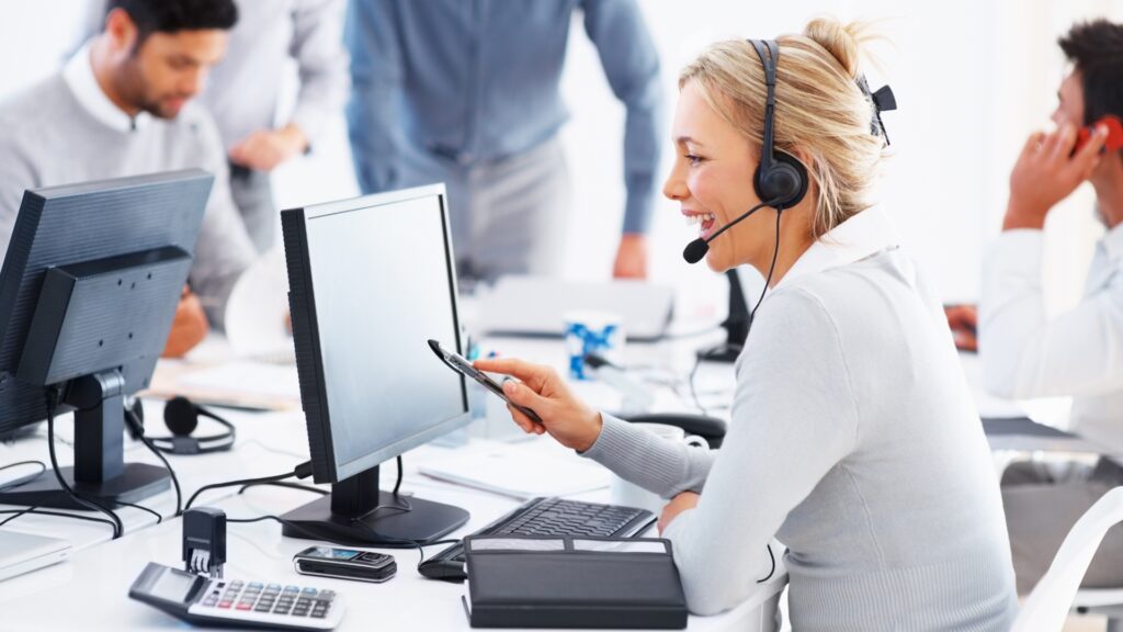 Lady on call from outsource IT Support Services